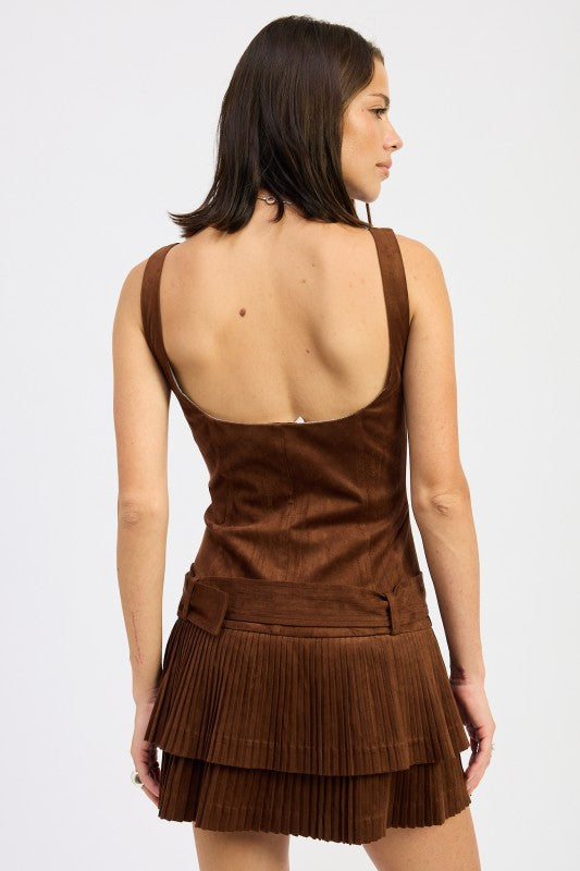 back view of brown mini dress with low scoop back