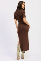 Back view of ribbed mocha dress showing fitted silhouette and slit detail.