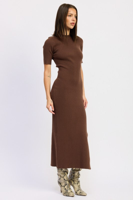 Full-length view of mocha rib knit dress styled with boots.
