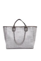 Gray canvas tote bag with clean lines, chain strap, and minimalist design