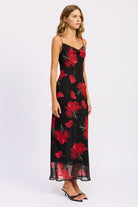 Side view of black slip maxi dress with red floral print and cowl neckline-AVAH