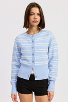 Model wearing light blue and white striped cardigan buttoned at front -AVAH
