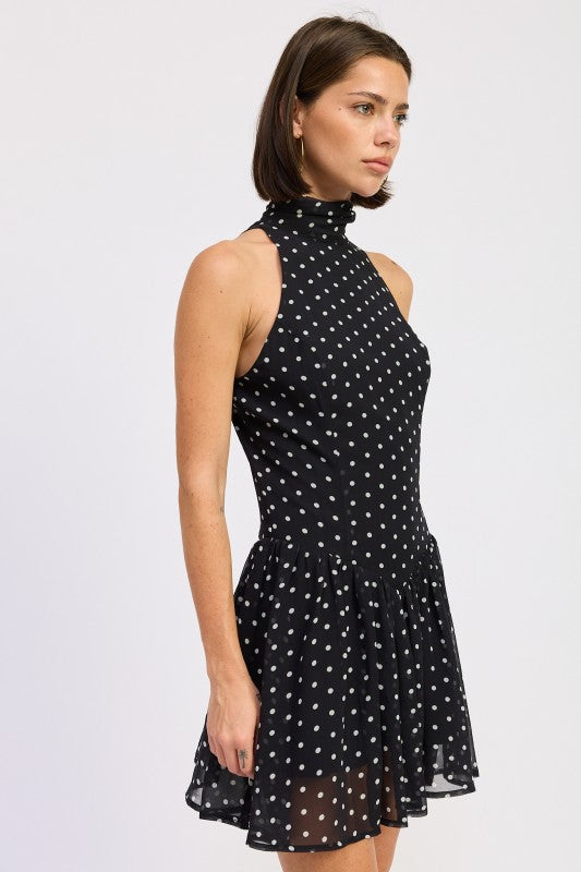 Black polka dot halter mini dress side profile view

