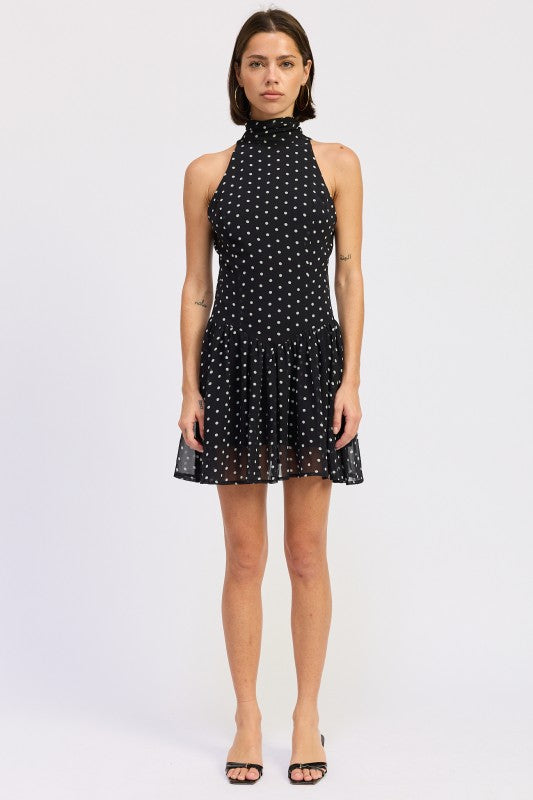 Black polka dot halter mini dress full-length front view
