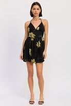 Black halter mini dress with gold floral print, front full-body view-AVAH