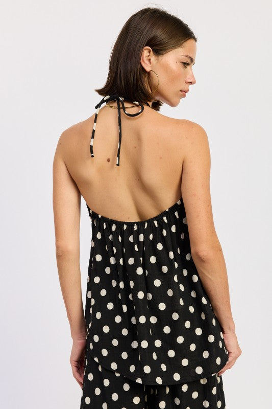 Back view of polka dot halter top showing open back and halter tie