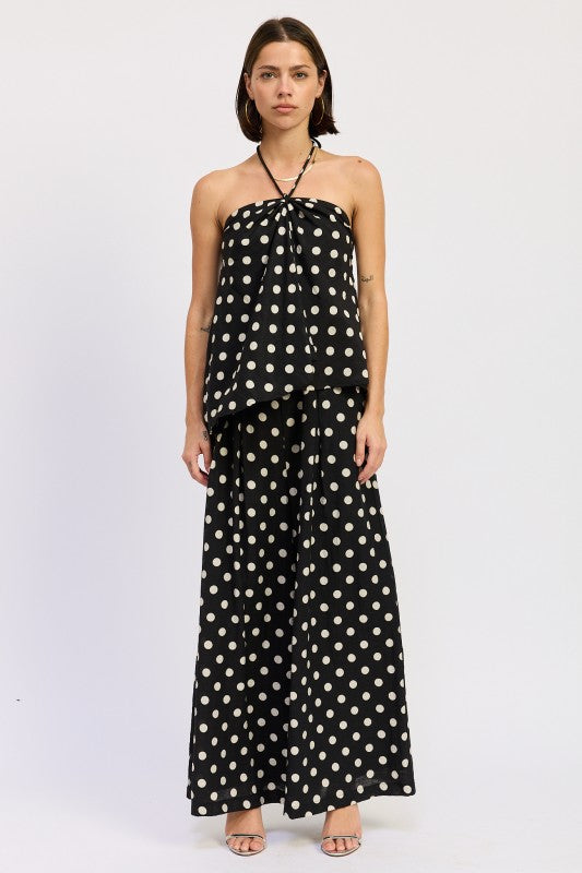 Polka dot halter top paired with matching wide-leg pants, full look
