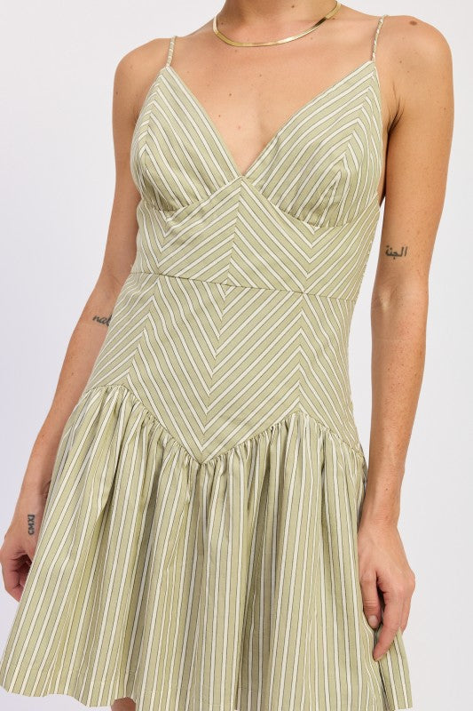 Close up of sage striped bodice with angled seam detail