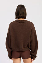 Back view of mocha cardigan showing clean knit texture without embroidery.