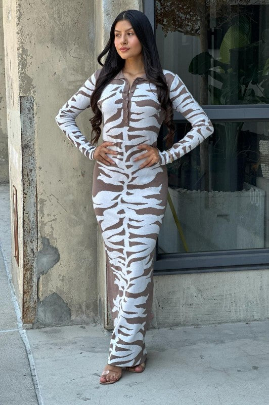 Long sleeve maxi dress with an abstract animal print in brown and ivory with button front and collared neckline.
