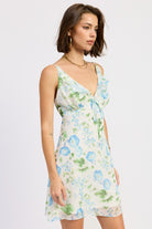 Ivory blue floral mini dress angled side view
