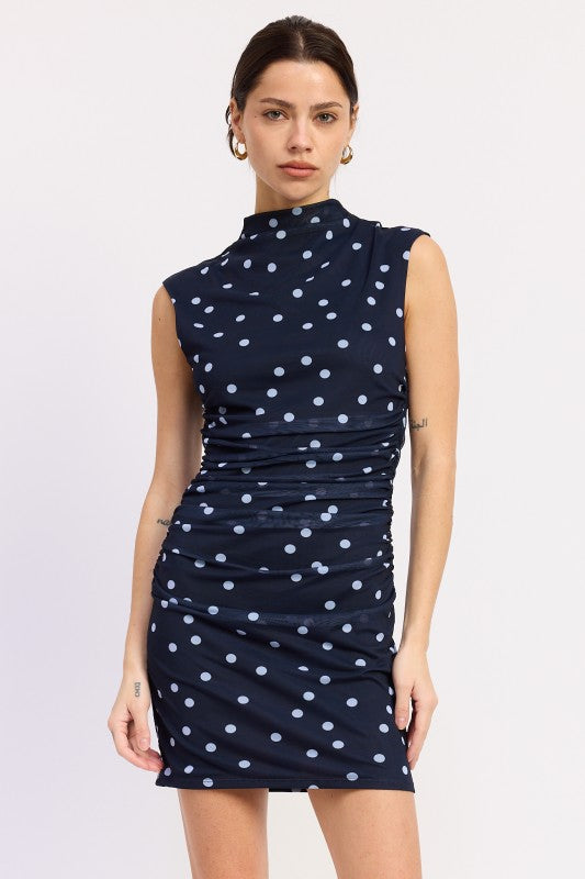 Navy polka dot ruched mini dress front view
