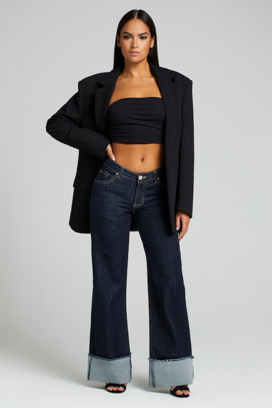 Dark wash wide leg jeans with oversized cuff hem front view