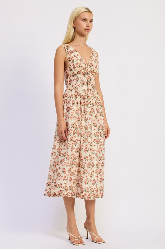 Side view of floral corset midi dress showing silhouette and movement
