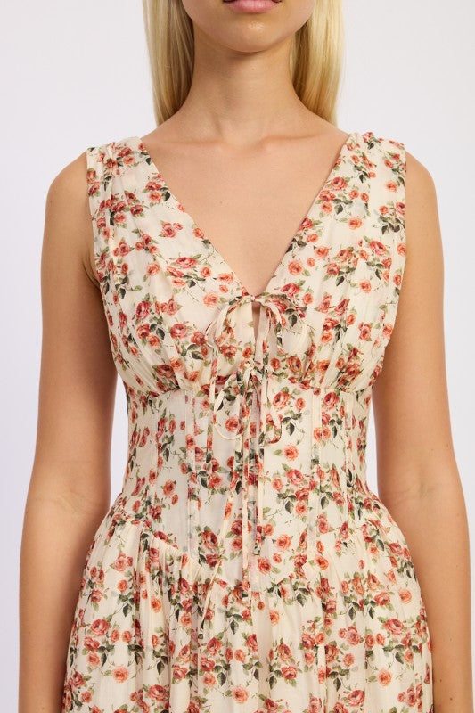 Close-up of floral corset bodice with tie detail and vertical seaming
