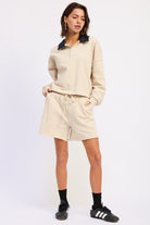 Ivory lounge shorts with drawstring waist and long sleeve top