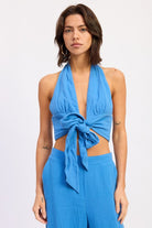 Blue cotton halter top with front tie and open back styled with matching pants