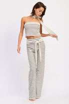 Ivory striped wide leg knit pants with coordinating sash tie front view