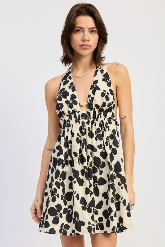 Black floral halter mini dress front view flowy silhouette