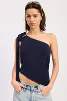 Front view of navy one shoulder asymmetrical top with shoulder tie detail
