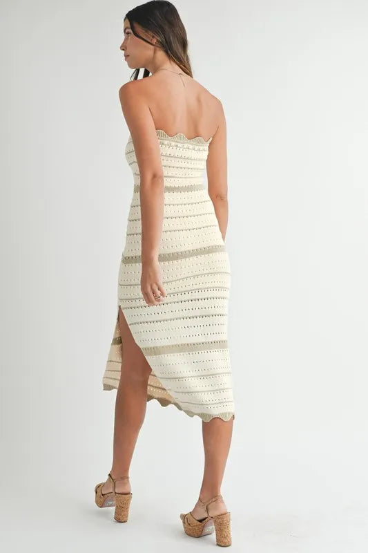 Back view of body-skimming crochet knit midi dress
