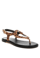 Leopard print thong sandal with buckle strap close-up view