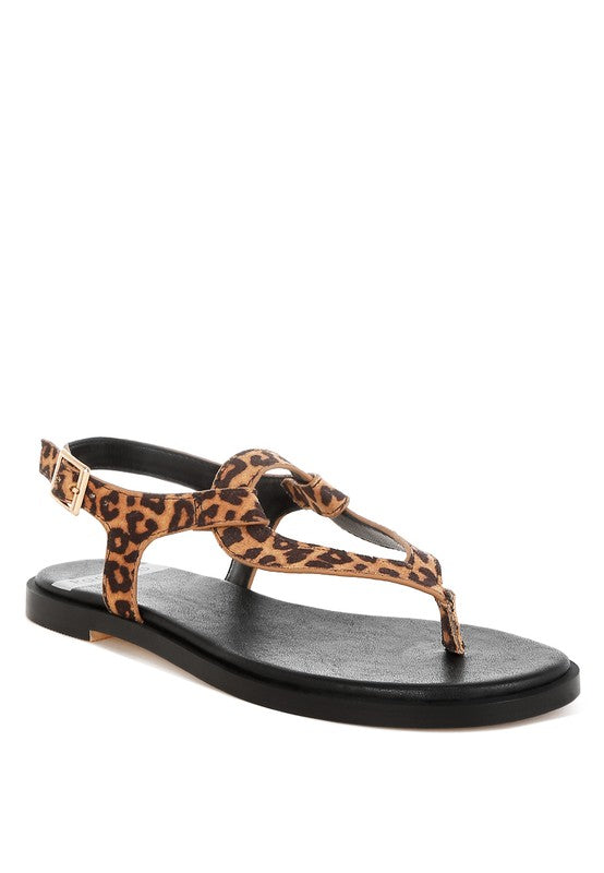 Leopard print thong sandal with buckle strap close-up view