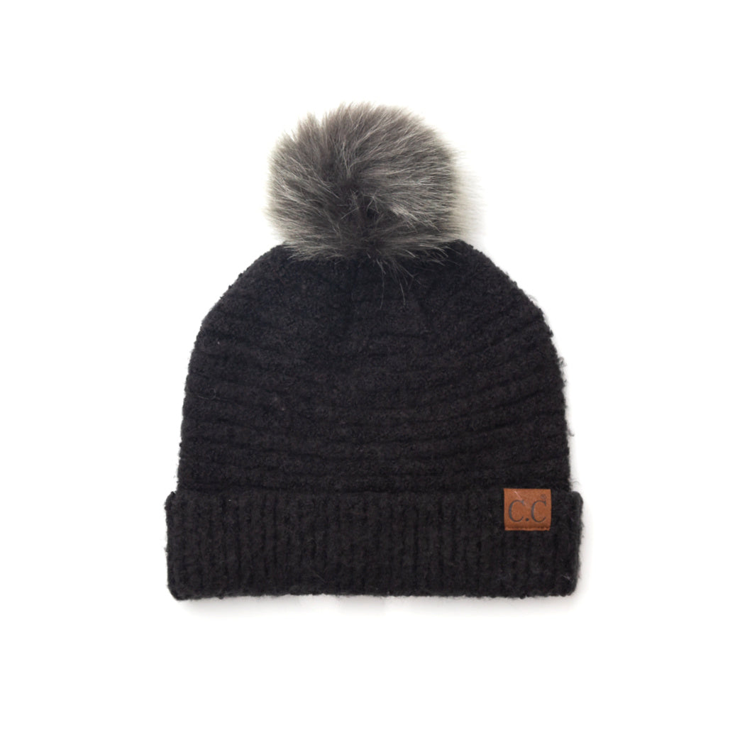 Navy boucle knit hat with faux fur pom 