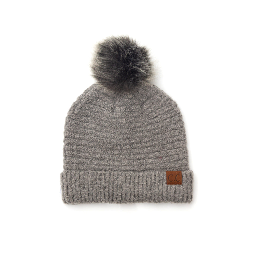 gray boucle knit hat with faux fur pom 