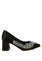 Side view of black satin pointed-toe heel with crystals
