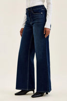 Going Places High Rise Wide Leg Jeans in dark indigo wash, side view close up