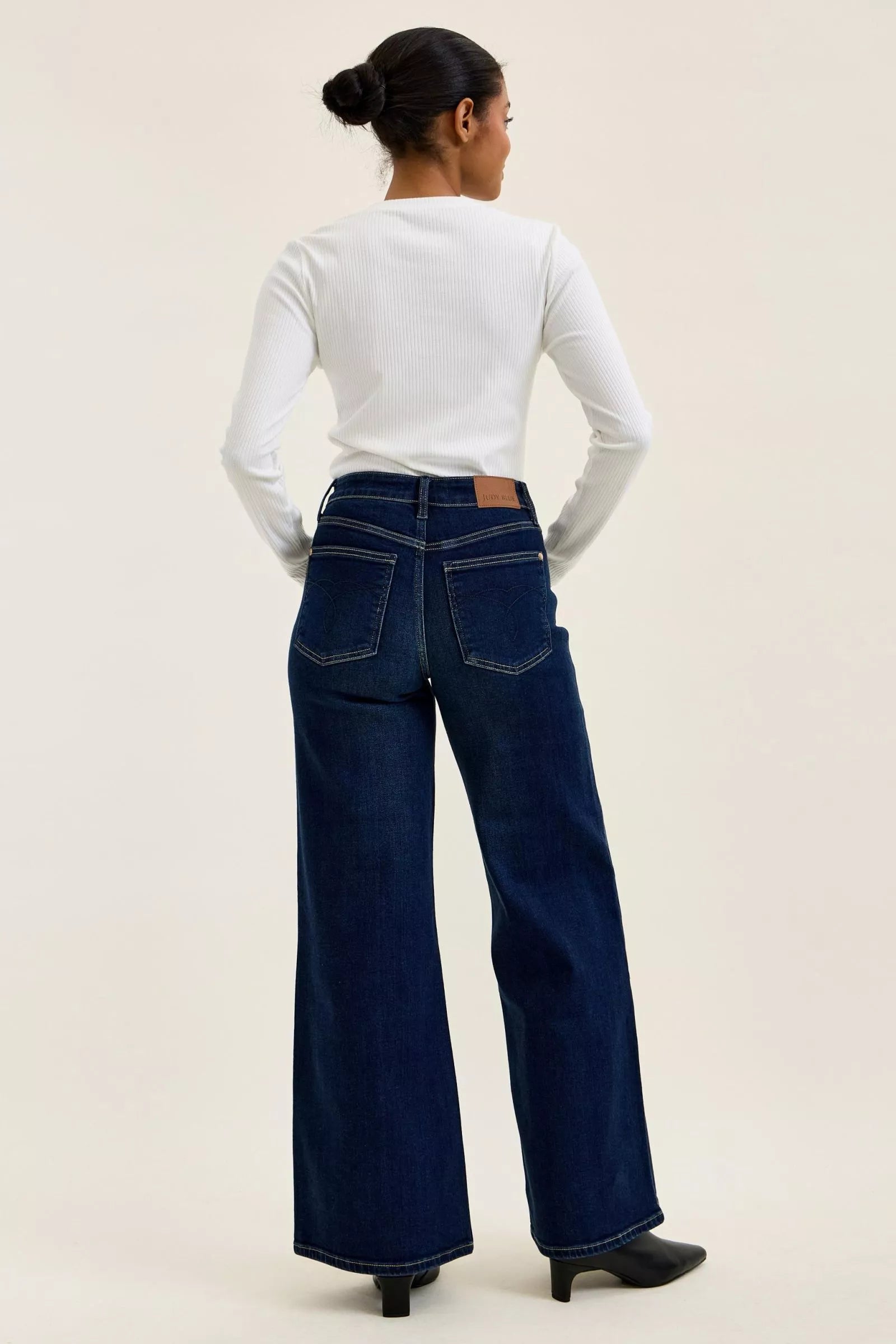 Going Places High Rise Wide Leg Jeans in dark indigo wash, full back view