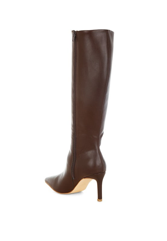 Back angled view of sleek brown knee-high boot with stiletto heel.
