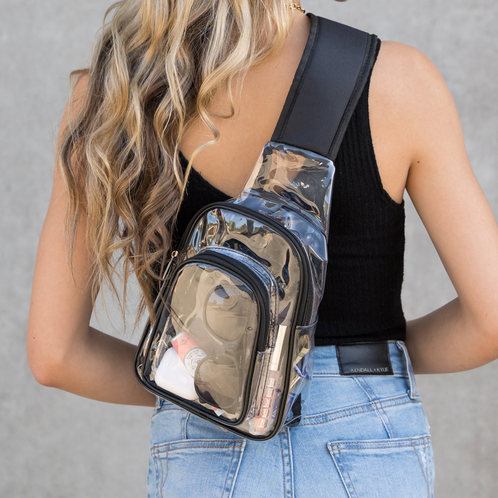 Back view of clear stadium-approved crossbody sling bag with padded shoulder strap
