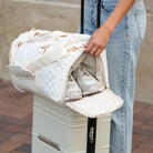 AVAH-Weekend Bliss Quilted Travel Bag in Bisque featuring a timeless design with vegan leather accents, Exterior open side pocket, luggage/trolley sleeve, shoe compartment, zip pocket and gold hardware