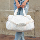 AVAH-Weekend Bliss Quilted Travel Bag in Bisque featuring a timeless design with vegan leather accents, Exterior open side pocket, luggage/trolley sleeve, shoe compartment, zip pocket and gold hardware