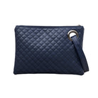 Navy quilted clutch made with a premium soft quilted PU leather and cotton Herringbone print lining with grommet detail and wristlet.