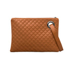 Cognac quilted clutch made with a premium soft quilted PU leather and cotton Herringbone print lining with grommet detail and wristlet.