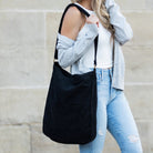 AVAH -corduroy tote bag with adjustable shoulder strap and exterior pockets in black
