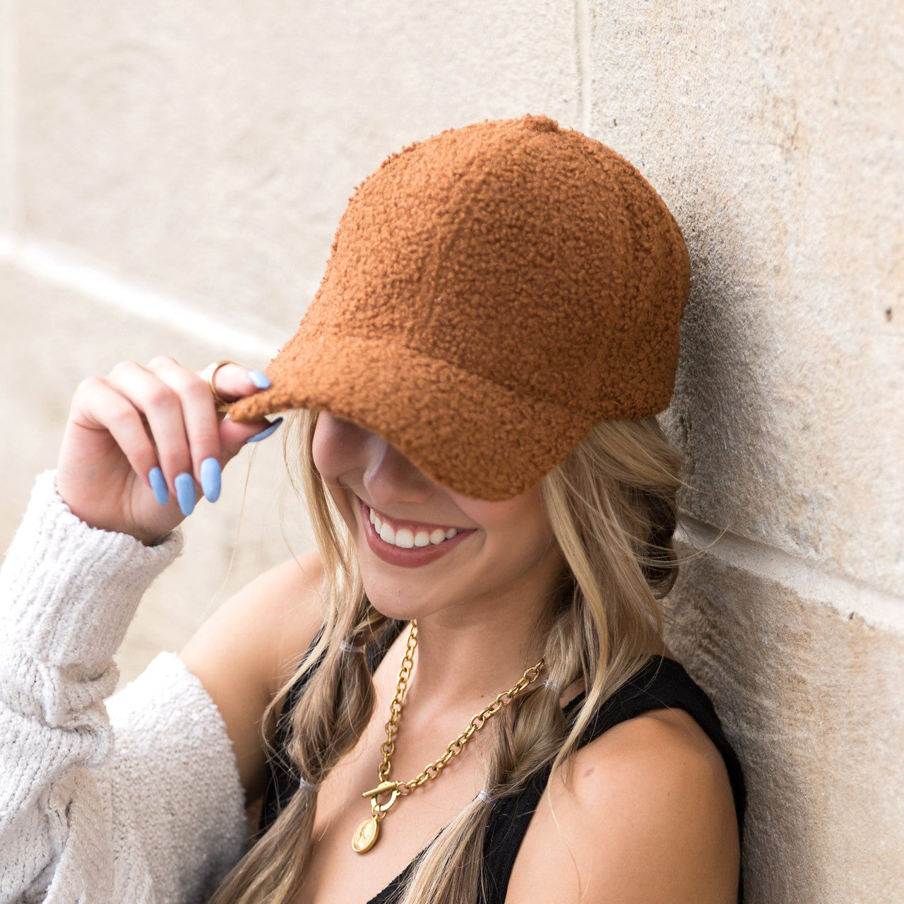 sherpa-texture baseball cap with adjustable fit in dark camel 
