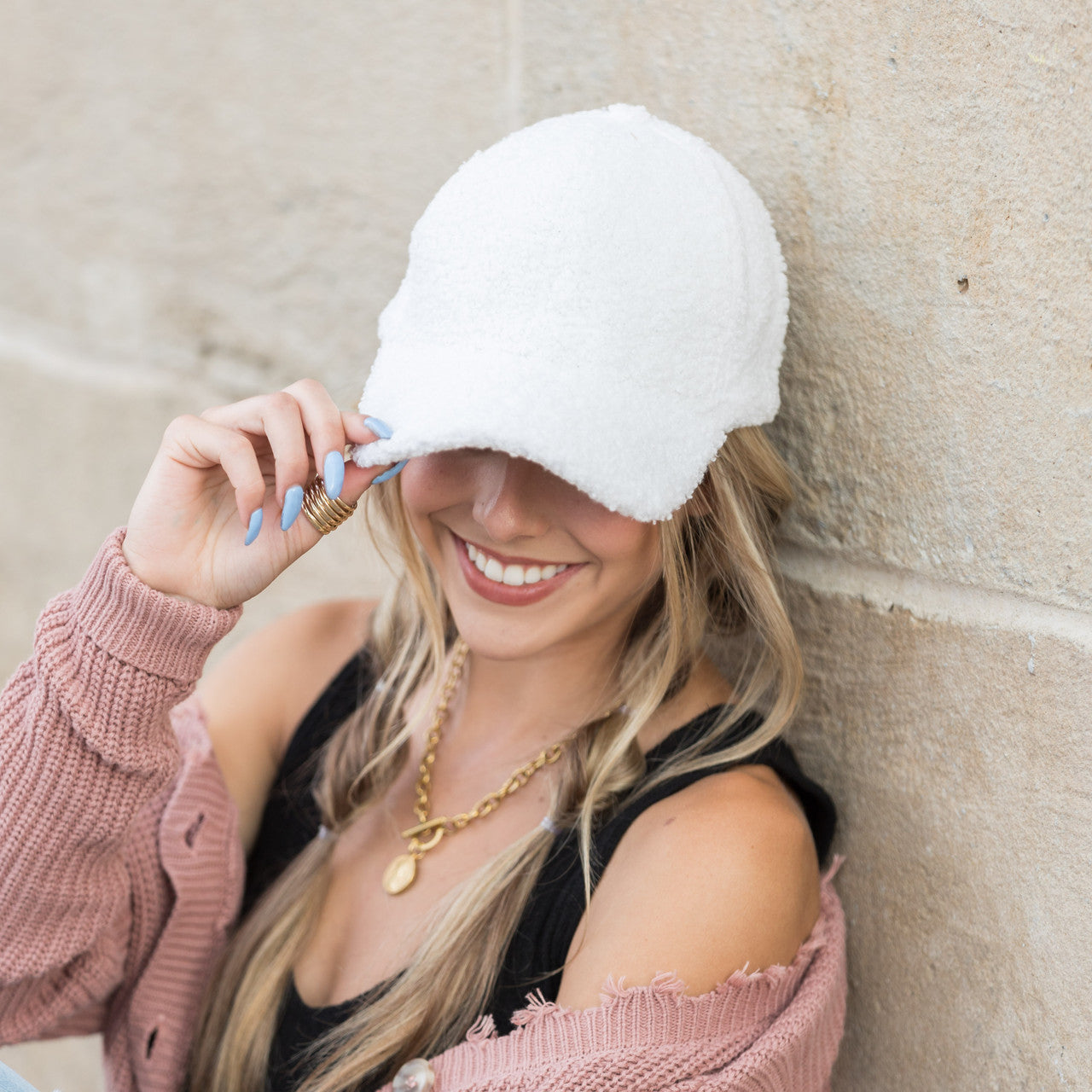 sherpa-texture baseball cap with adjustable fit in white