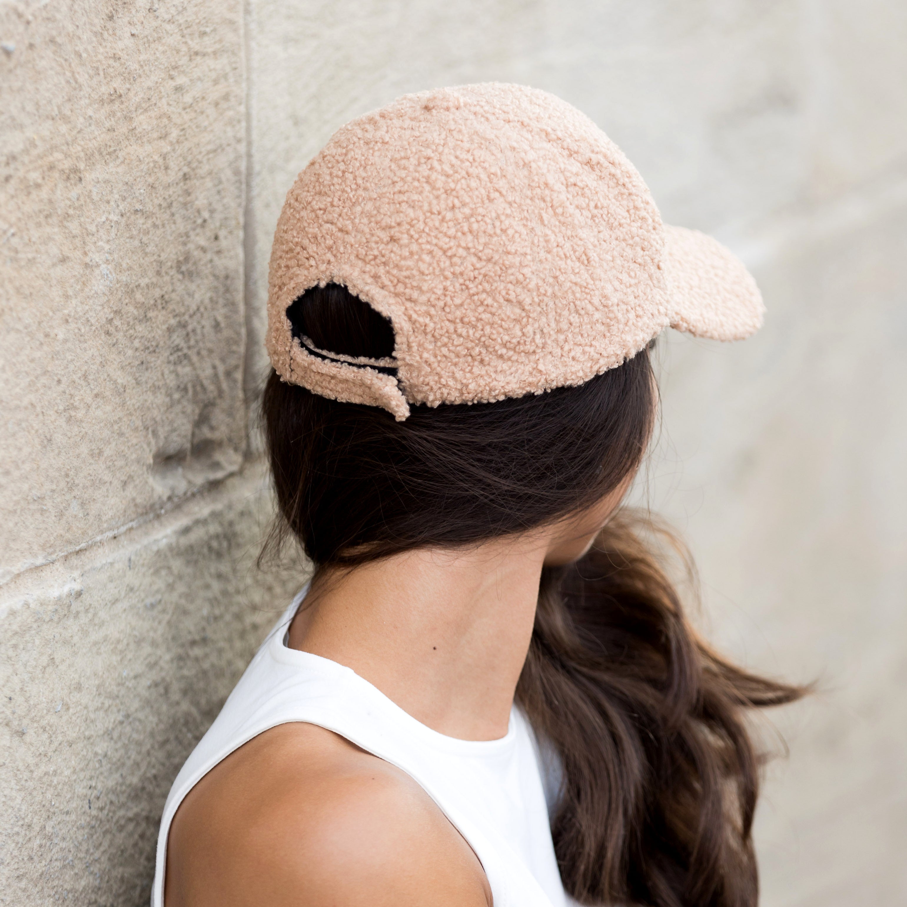 sherpa-texture baseball cap with adjustable fit in blush back view