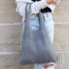 Soft-knit woven Hobo bag with open design in light gray 