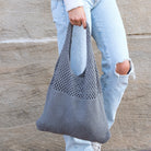 Soft-knit woven Hobo bag with open design in light gray