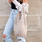 Soft-knit woven Hobo bag with open design in ash taupe