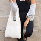 Soft-knit woven Hobo bag with open design in white