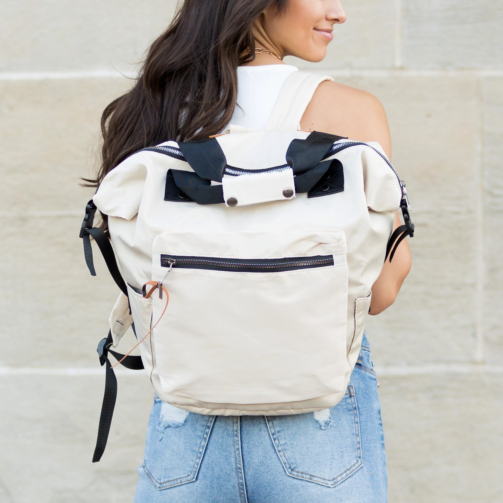 AVAH - beige utility backpack with front zip pocket and adjustable backpack straps