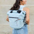 AVAH - dusty blue utility backpack with front zip pocket and adjustable backpack straps