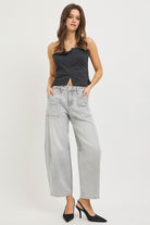 Grey barrel leg crop jeans with patch pockets styled with pinstripe tube top and heels, AVAH