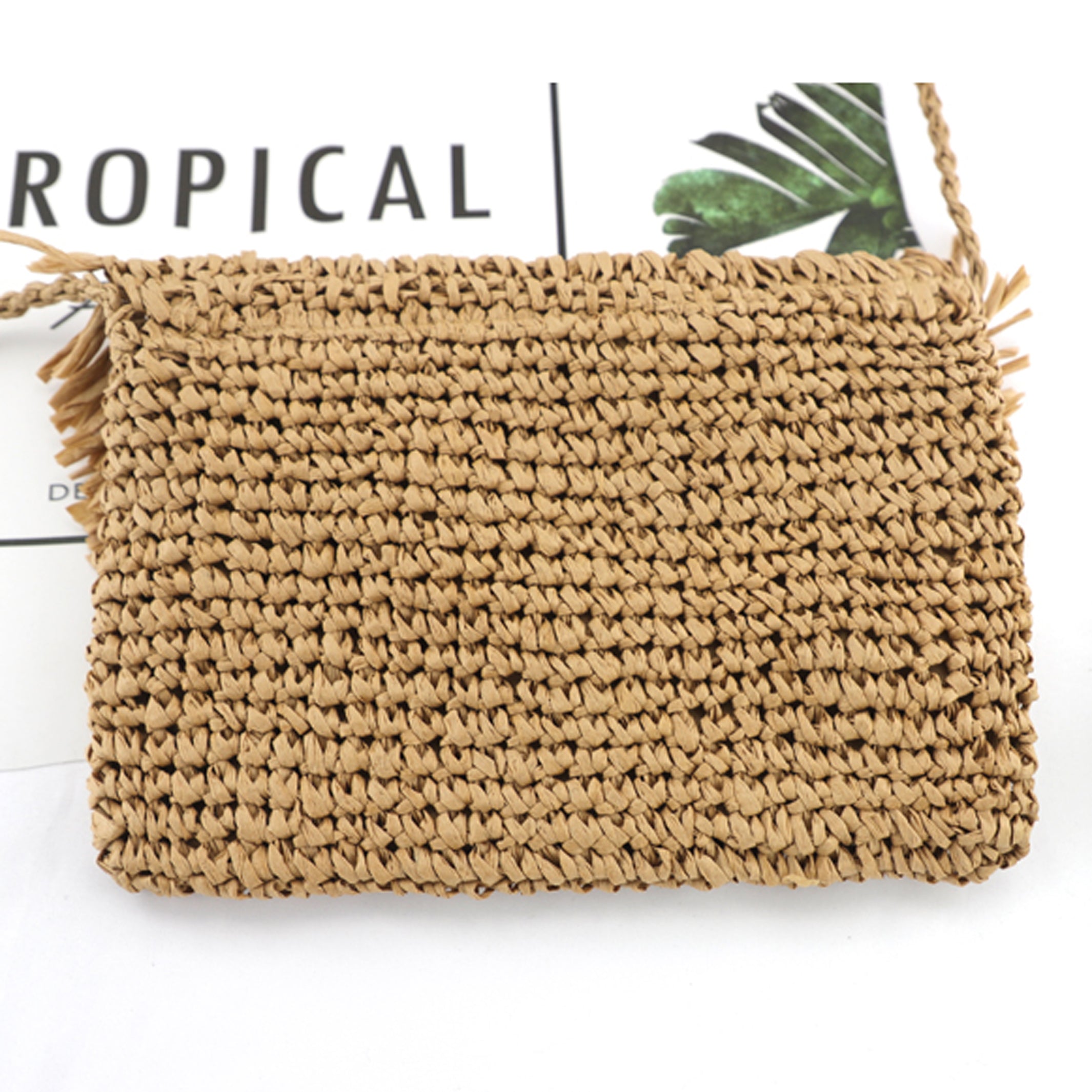 khaki woven straw crossbody with fringe flap detail, back view-AVAH